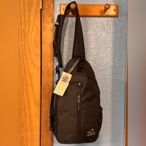 WATERFLY Black Sling Backpack Unisex NWT